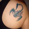 Poze Poze Tatuaje. Modele de Tatuaje (foto) - Scorpion albastru pe omoplat